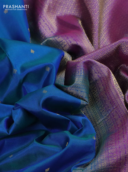 Pure kanchipuram silk saree dual shade of bluish green and purple with allover zari woven 1000 buttas and small zari woven border