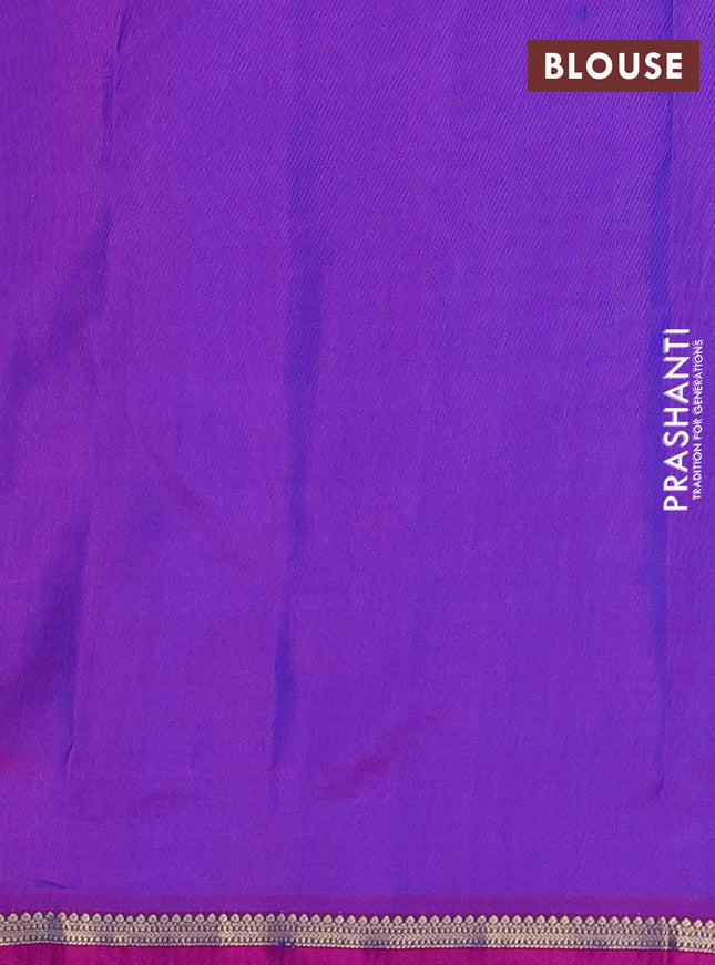 Pure kanchipuram silk saree dual shade of bluish green and purple with allover zari woven 1000 buttas and small zari woven border