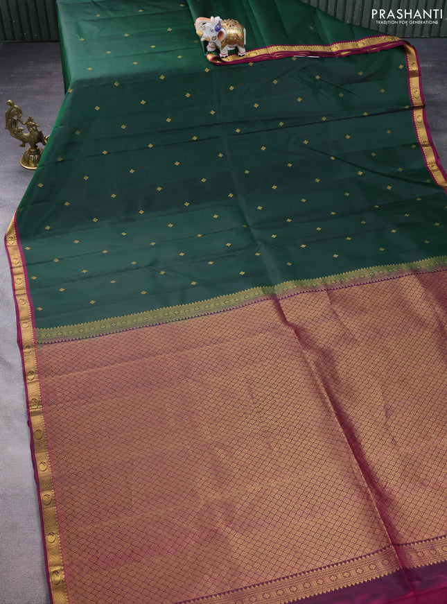 Pure kanchipuram silk saree bottle green and dark magenta pink with zari woven buttas and small zari woven border