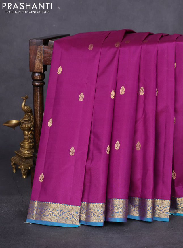 Pure kanchipuram silk saree purple and dual shade of teal green with zari woven buttas and zari woven border