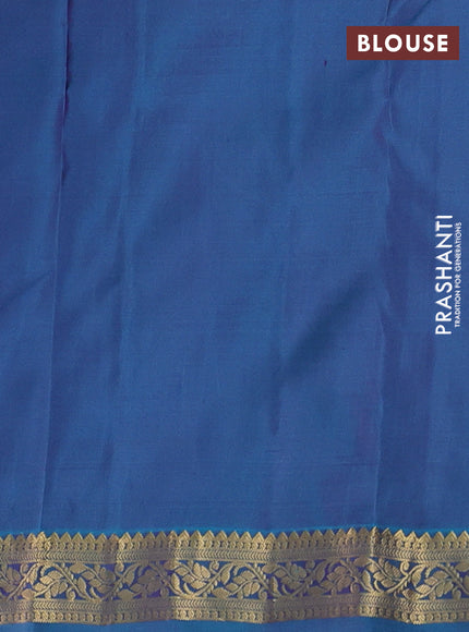 Pure kanchipuram silk saree purple and dual shade of teal green with zari woven buttas and zari woven border