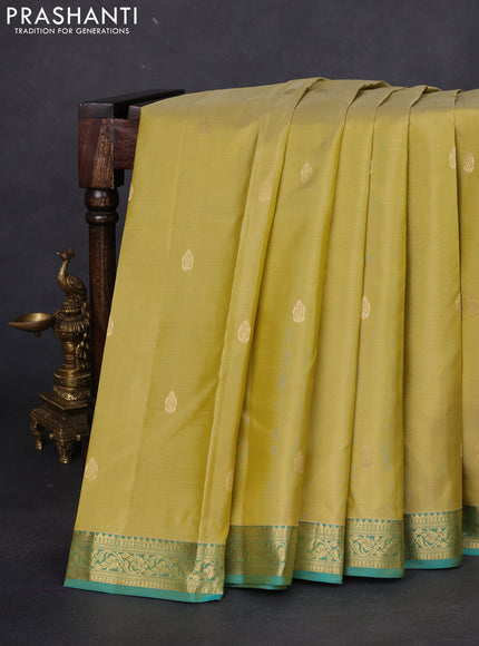 Pure kanchipuram silk saree yellow shade and teal green with zari woven buttas and zari woven border