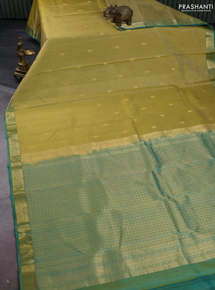 Pure kanchipuram silk saree yellow shade and teal green with zari woven buttas and zari woven border