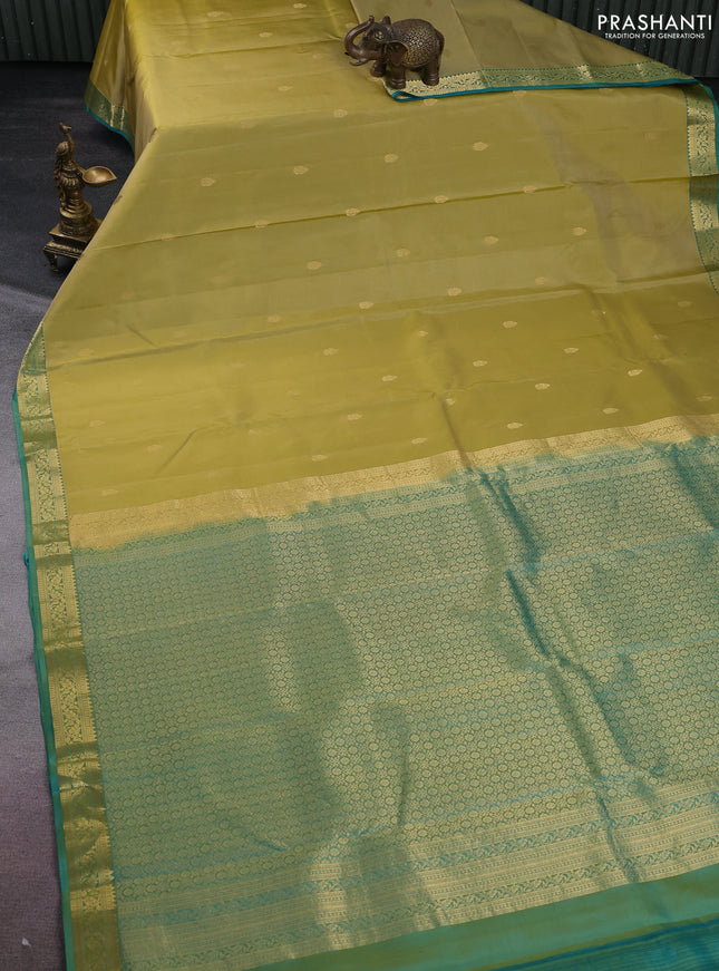 Pure kanchipuram silk saree yellow shade and teal green with zari woven buttas and zari woven border