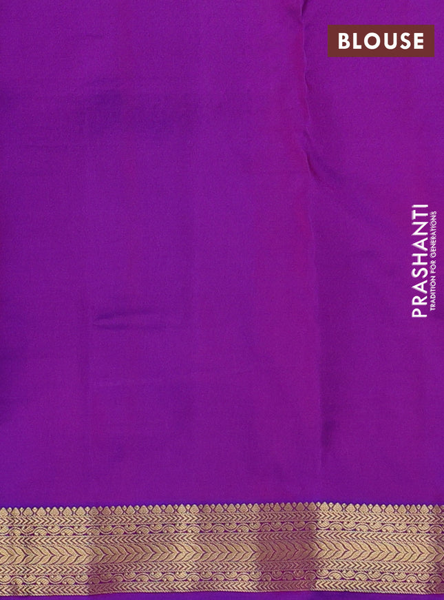 Pure kanchipuram silk saree dual shade of pinkish yellow and purple with allover zari woven buttas and zari woven border