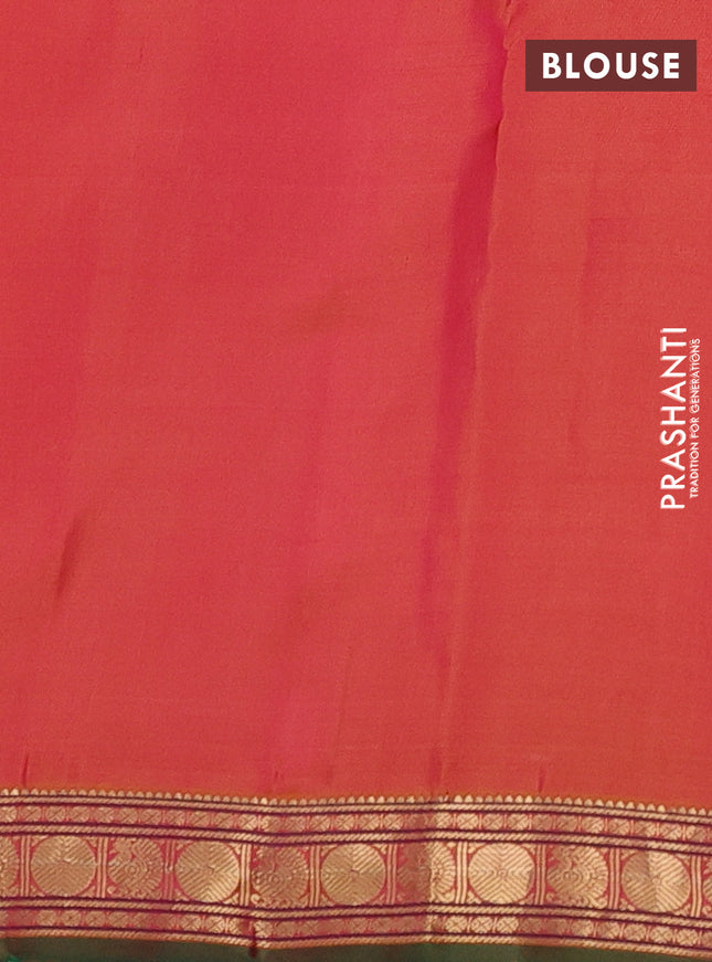 Pure kanchipuram silk saree dual shade of pinkish yellow and green with zari woven geometric buttas and zari woven border