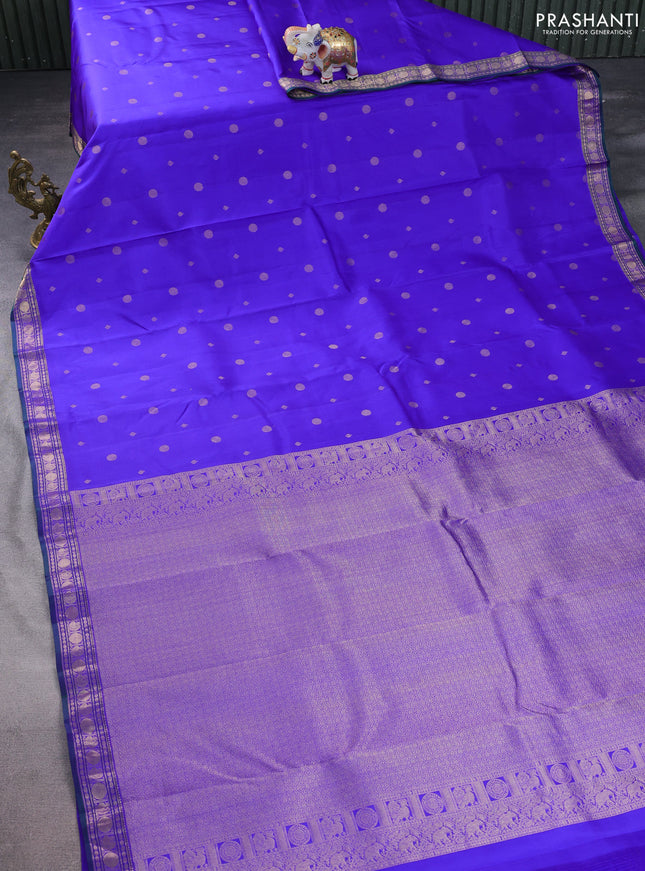 Pure kanchipuram silk saree royal blue and green with zari woven geometric buttas and zari woven border