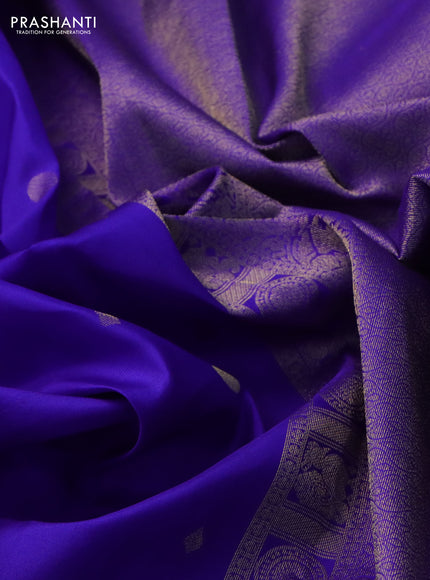 Pure kanchipuram silk saree royal blue and green with zari woven geometric buttas and zari woven border