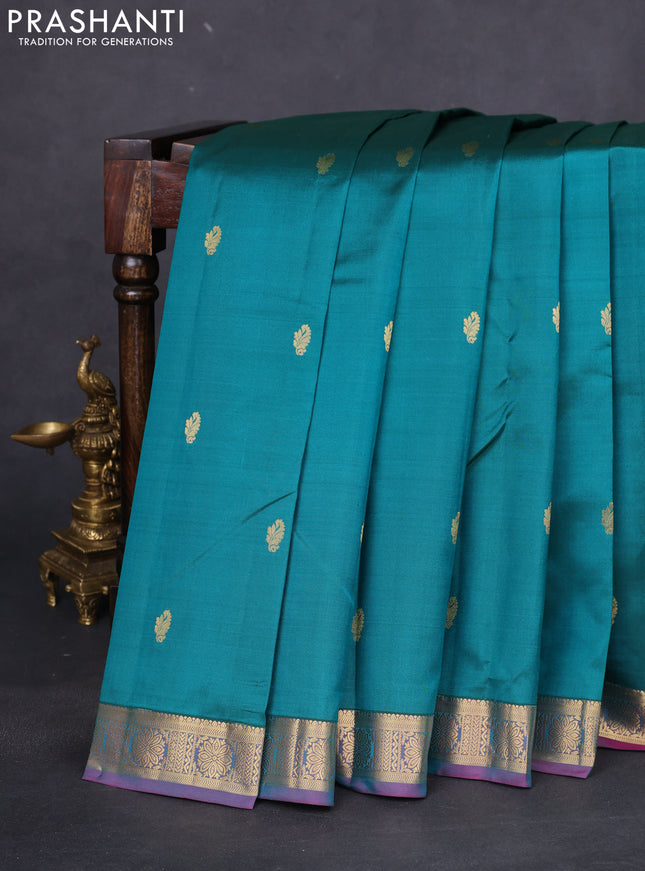 Pure kanchipuram silk saree peacock green and purple with zari woven buttas and zari woven border