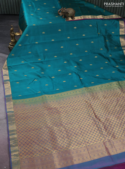 Pure kanchipuram silk saree peacock green and purple with zari woven buttas and zari woven border