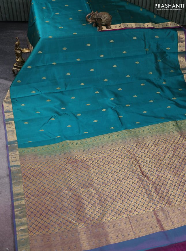 Pure kanchipuram silk saree peacock green and purple with zari woven buttas and zari woven border