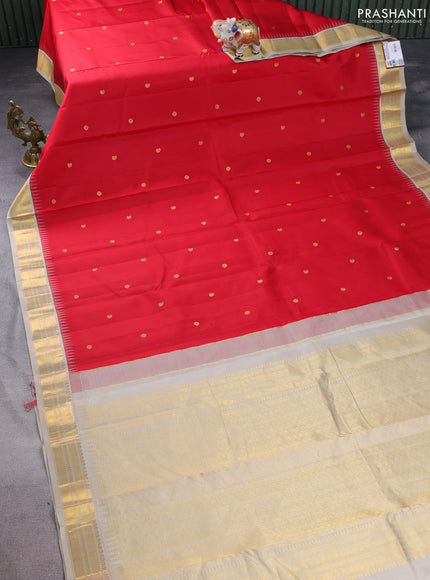 Pure kanchipuram silk saree red and beige with zari woven buttas and temple design zari woven korvai border