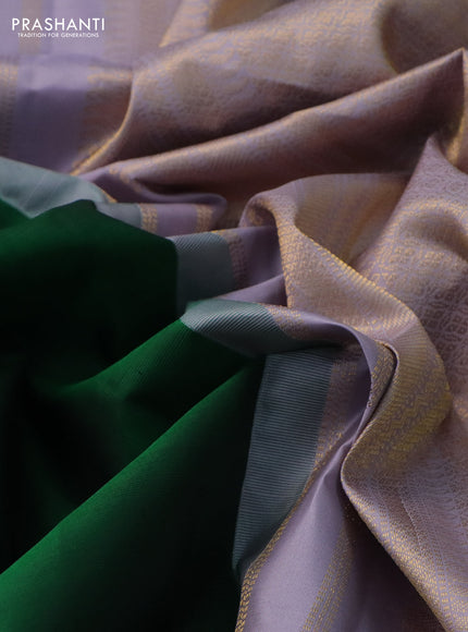 Pure kanchipuram silk saree green and pastel lavender with plain body and temple design zari woven korvai border