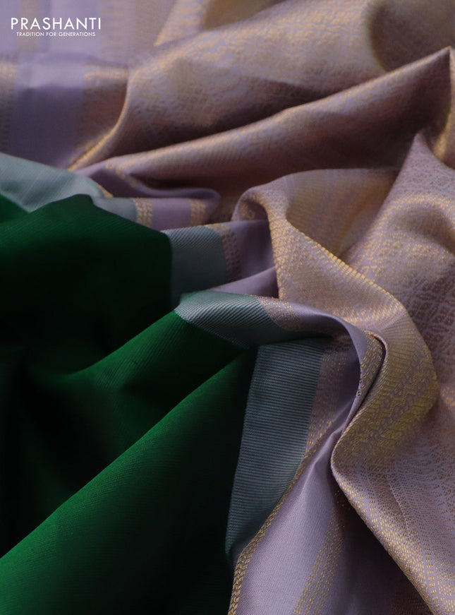 Pure kanchipuram silk saree green and pastel lavender with plain body and temple design zari woven korvai border