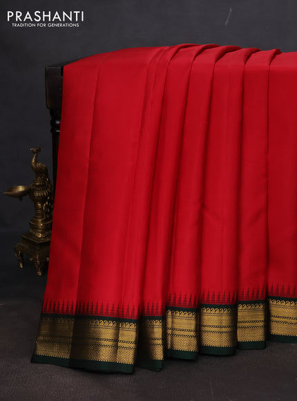 Pure kanchipuram silk saree red and bottle green with plain body and temple design zari woven korvai border