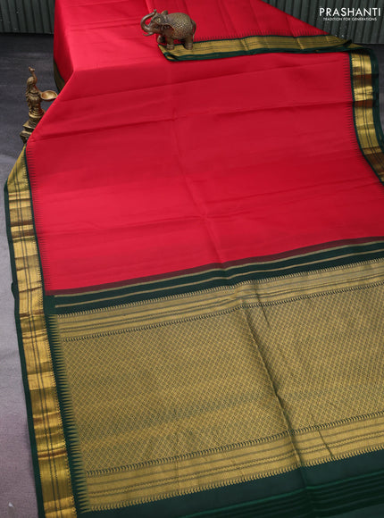 Pure kanchipuram silk saree red and bottle green with plain body and temple design zari woven korvai border