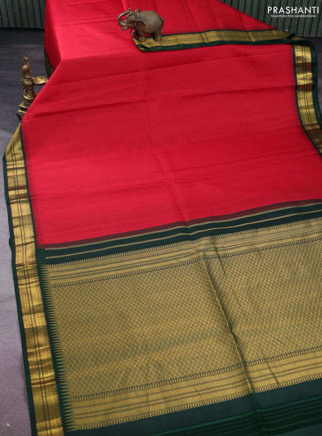 Pure kanchipuram silk saree red and bottle green with plain body and temple design zari woven korvai border