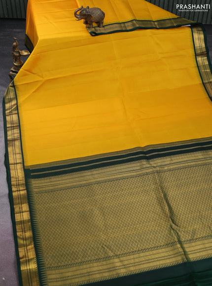Pure kanchipuram silk saree yellow and bottle green with plain body and temple design zari woven korvai border
