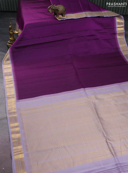 Pure kanchipuram silk saree purple and grey shade with plain body and temple design zari woven korvai border
