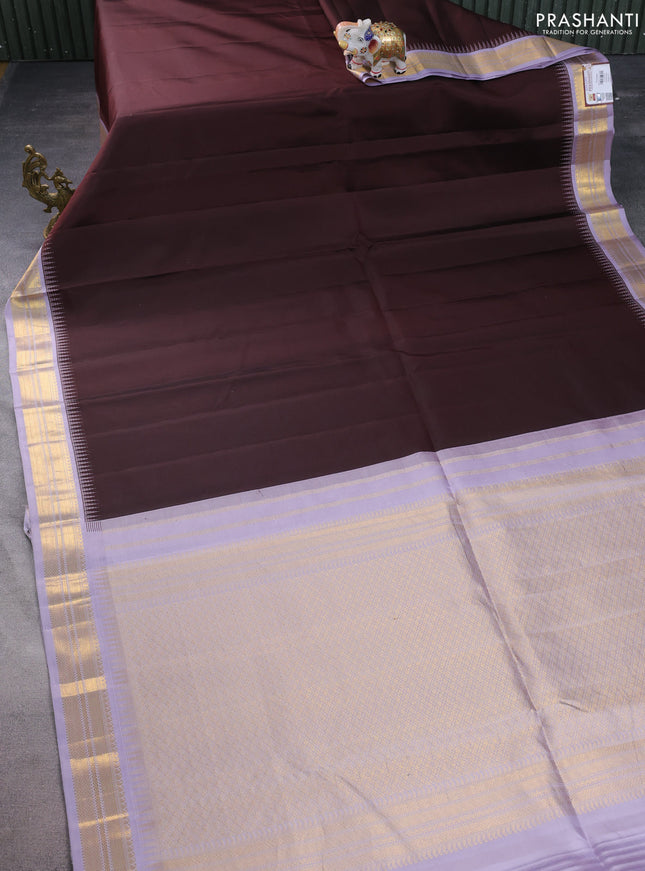 Pure kanchipuram silk saree coffee brown and pastel lavender with plain body and temple design zari woven korvai border
