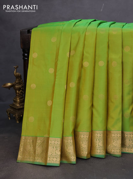 Pure kanchipuram silk saree light green and dual shade of green with zari woven buttas and annam zari woven border