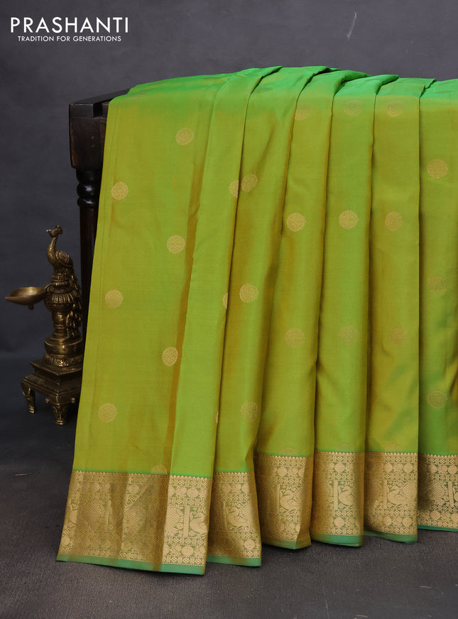 Pure kanchipuram silk saree light green and dual shade of green with zari woven buttas and annam zari woven border