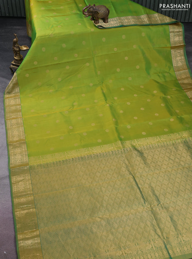 Pure kanchipuram silk saree light green and dual shade of green with zari woven buttas and annam zari woven border