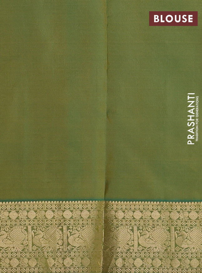 Pure kanchipuram silk saree light green and dual shade of green with zari woven buttas and annam zari woven border