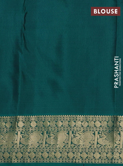 Pure kanchipuram silk saree rust shade and teal green with zari woven buttas and annam zari woven border