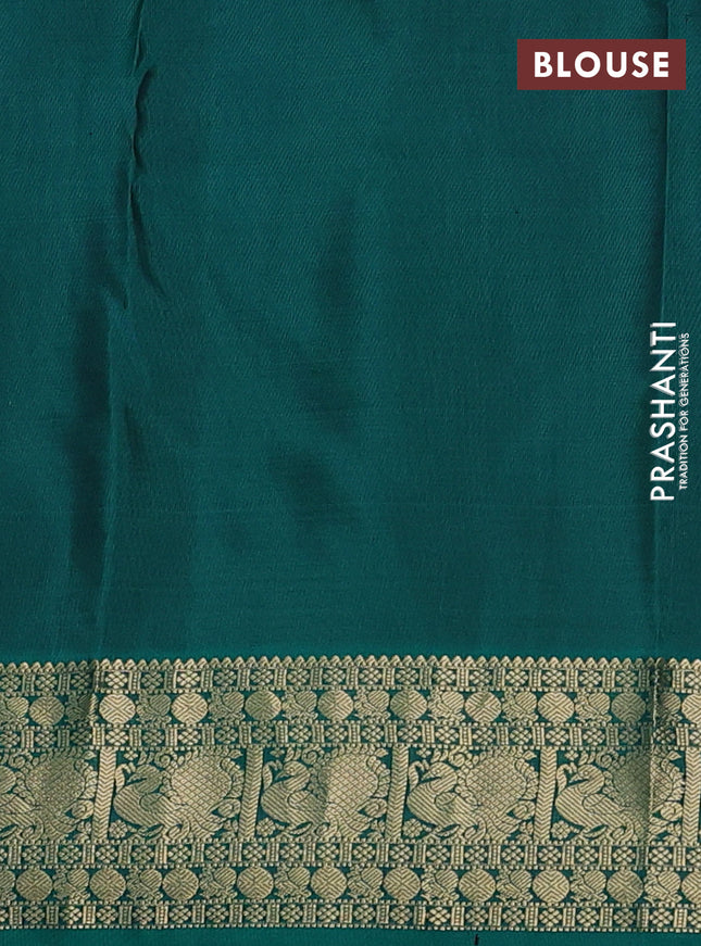 Pure kanchipuram silk saree rust shade and teal green with zari woven buttas and annam zari woven border