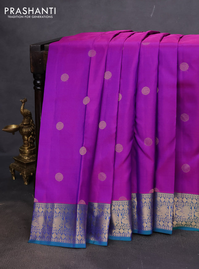 Pure kanchipuram silk saree purple and dual shade of teal green with zari woven buttas and annam zari woven border