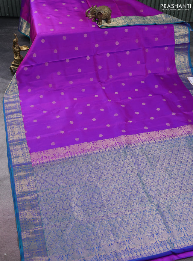 Pure kanchipuram silk saree purple and dual shade of teal green with zari woven buttas and annam zari woven border
