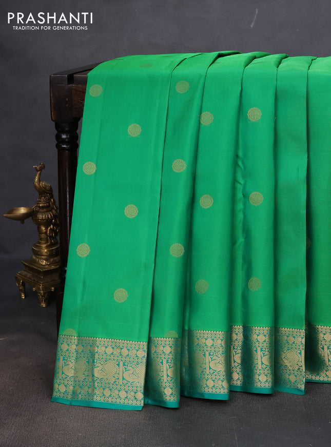 Pure kanchipuram silk saree green and teal green with zari woven buttas and annam zari woven border