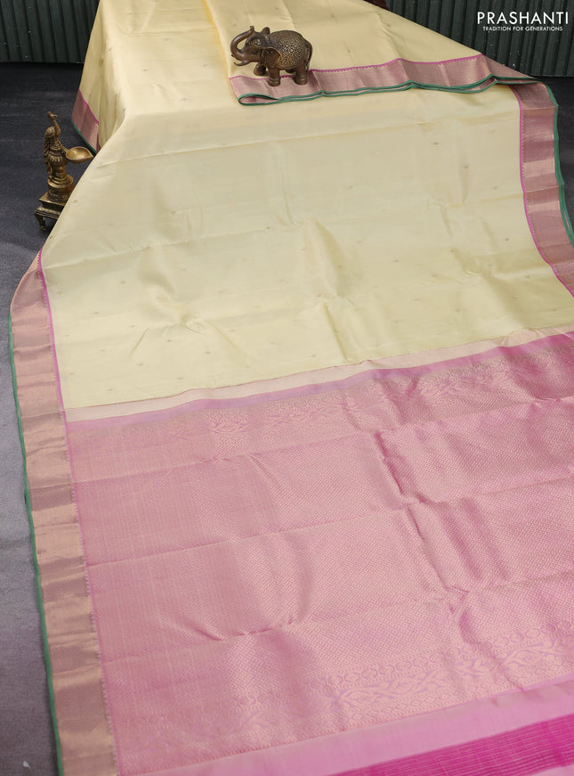 Pure kanchipuram silk saree cream and pink shade with zari woven buttas and rich zari woven border
