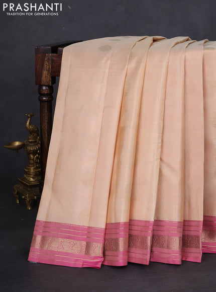 Pure kanchipuram silk saree cream and pink with zari woven buttas and zari woven border