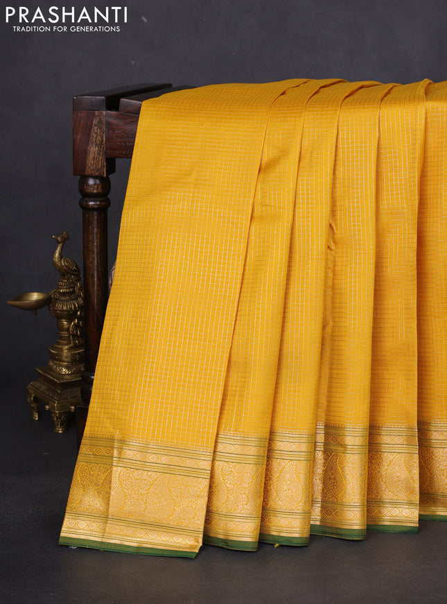Pure kanchipuram silk saree yellow and green with allover small zari checked pattern and zari woven border