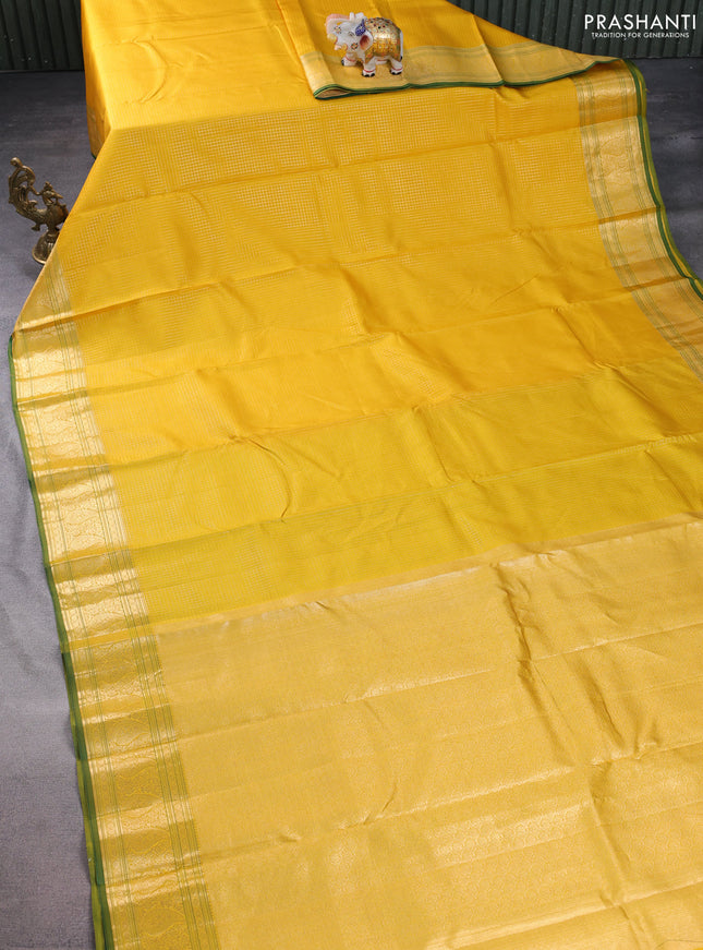 Pure kanchipuram silk saree yellow and green with allover small zari checked pattern and zari woven border