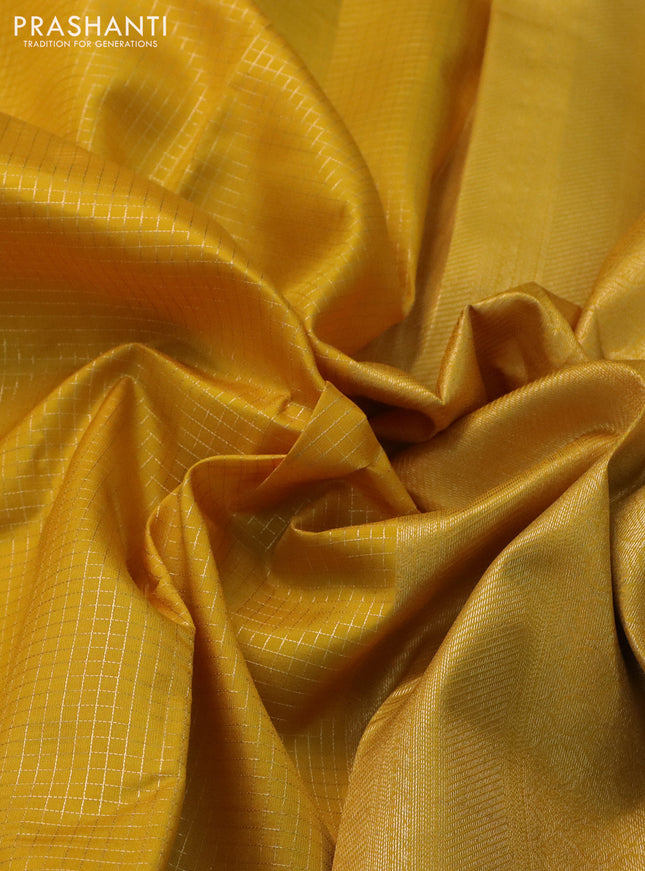 Pure kanchipuram silk saree yellow and green with allover small zari checked pattern and zari woven border