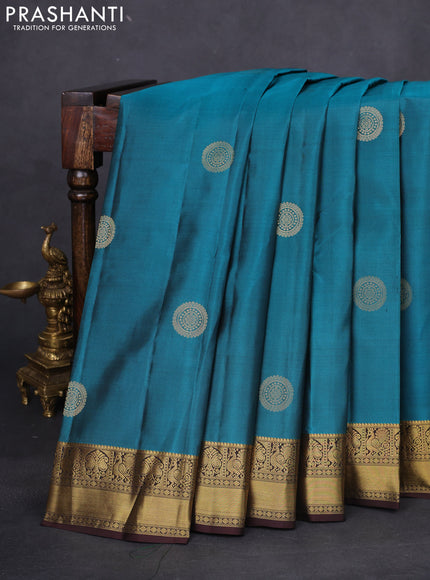 Pure kanchipuram silk saree peacock green shade and coffee brown with zari woven buttas and zari woven border