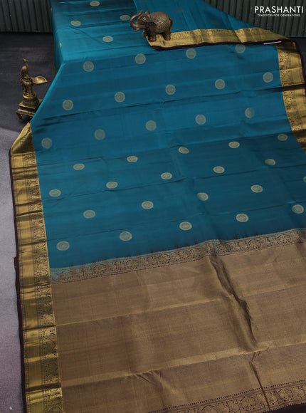 Pure kanchipuram silk saree peacock green shade and coffee brown with zari woven buttas and zari woven border
