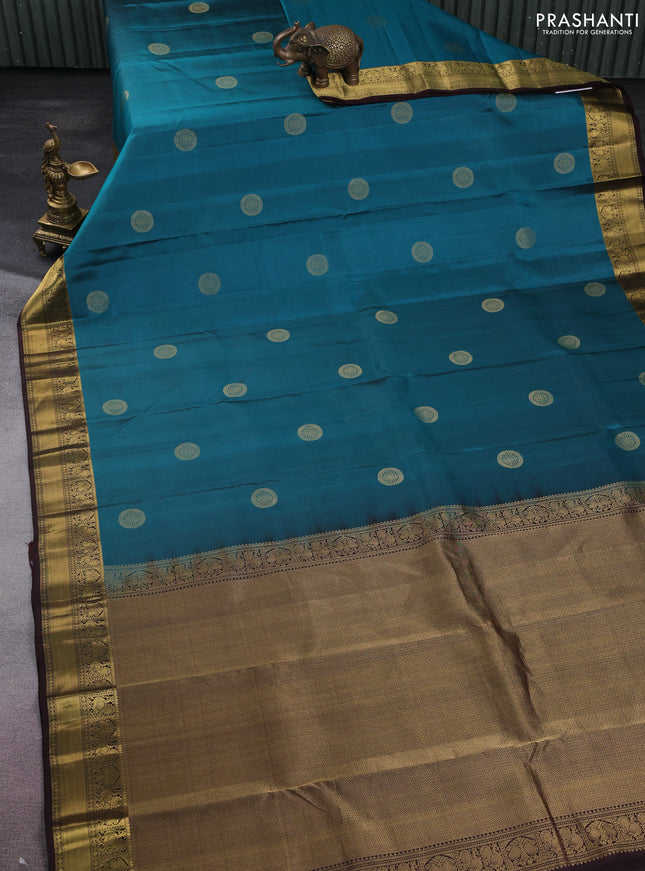 Pure kanchipuram silk saree peacock green shade and coffee brown with zari woven buttas and zari woven border