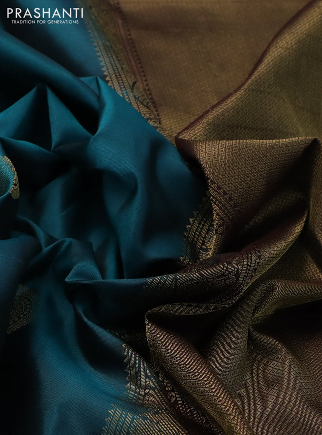 Pure kanchipuram silk saree peacock green shade and coffee brown with zari woven buttas and zari woven border