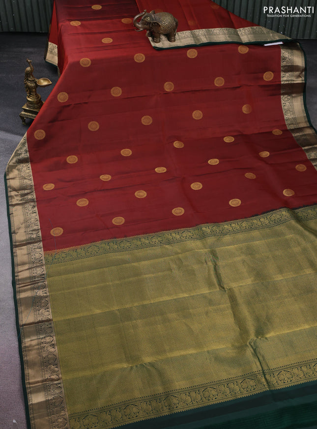 Pure kanchipuram silk saree rust shade and bottle green with zari woven buttas and zari woven border