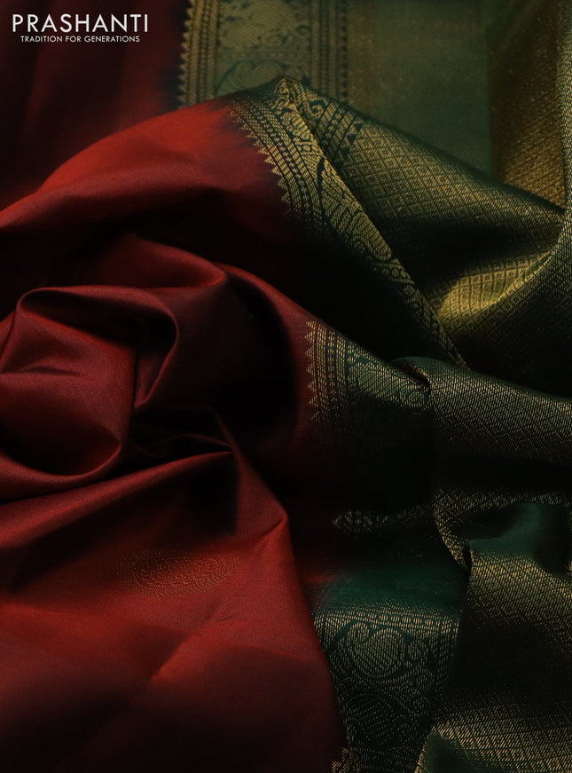 Pure kanchipuram silk saree rust shade and bottle green with zari woven buttas and zari woven border
