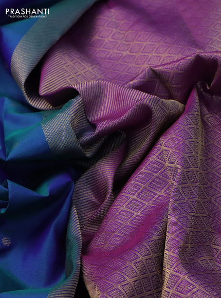 Pure kanchipuram silk saree dual shade of bluish green and purple with zari woven buttas and rich zari woven border
