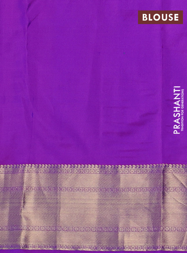Pure kanchipuram silk saree dual shade of bluish green and purple with zari woven buttas and rich zari woven border
