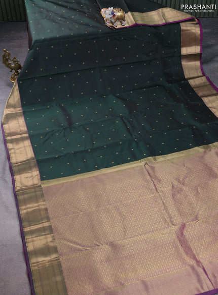 Pure kanchipuram silk saree bottle green and purple with zari woven buttas and rich zari woven border