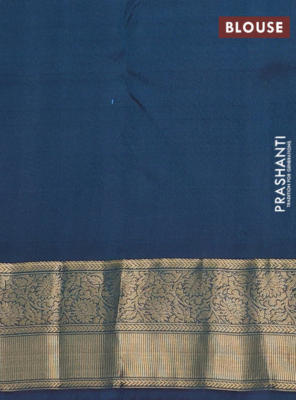 Pure kanchipuram silk saree teal green and dual shade of bluish maroon with paisley zari woven buttas and rich zari woven border