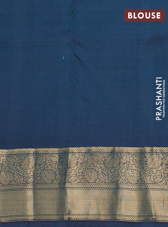 Pure kanchipuram silk saree teal green and dual shade of bluish maroon with paisley zari woven buttas and rich zari woven border