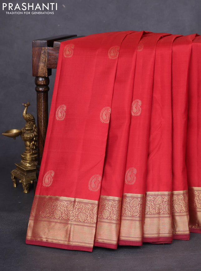 Pure kanchipuram silk saree maroon and deep maroon with paisley zari woven buttas and rich zari woven border